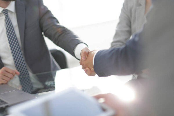 confident handshake of business partners