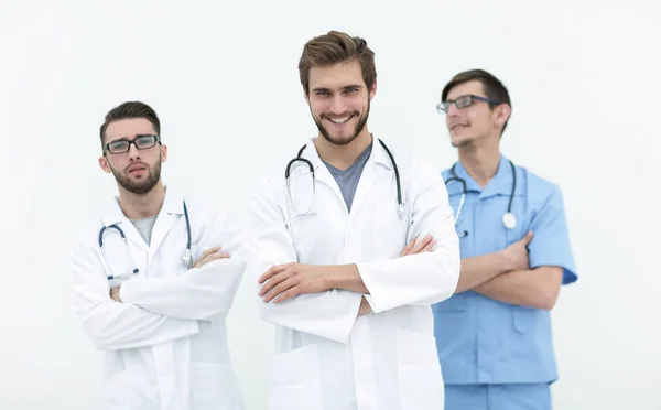 Freundliches Team erfolgreicher Ärzte. Isoliert auf weiß — Stockfoto