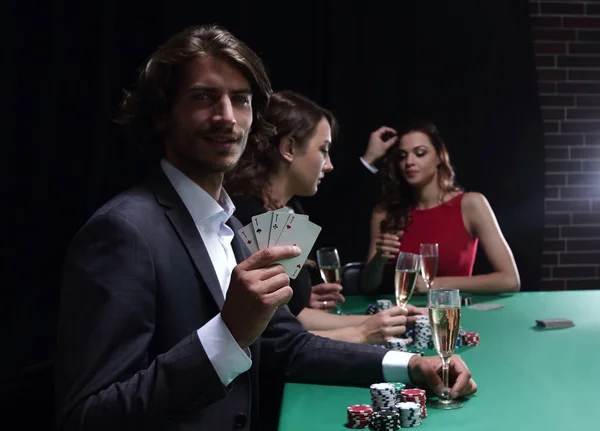 Group of sinister poker players — Stock Photo, Image