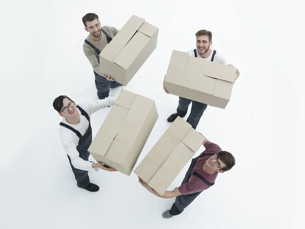 Győztesek emelő verem a költöztető dobozok elszigetelt fehér karton — Stock Fotó