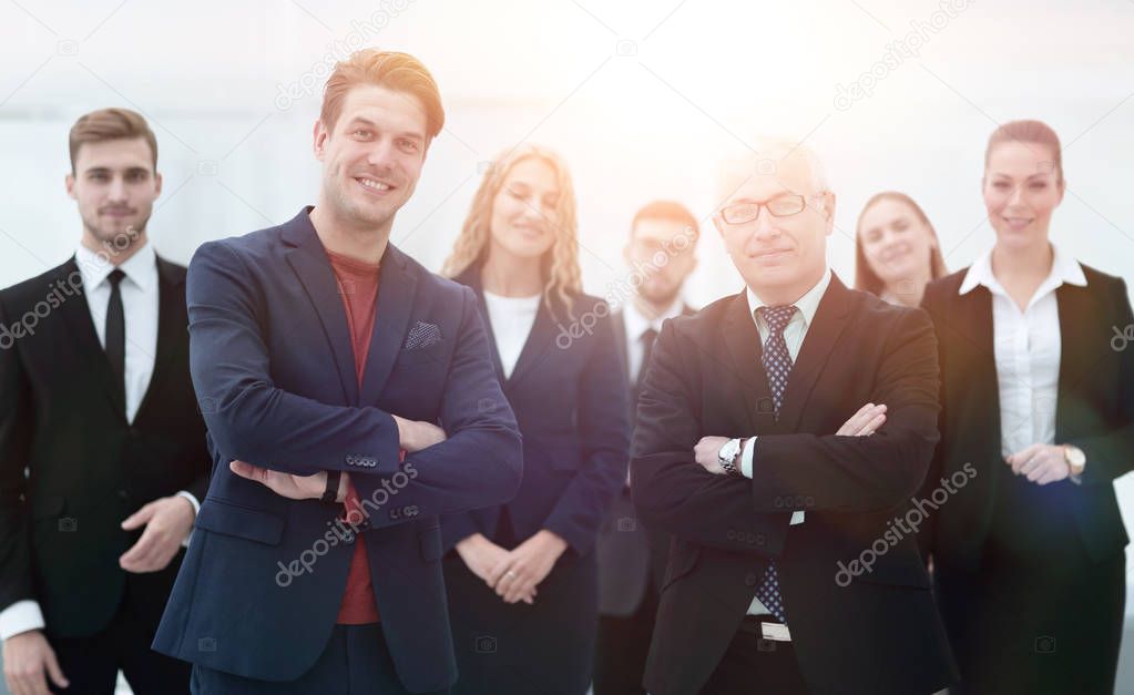 business partners standing in front of the business team.