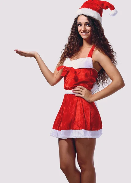 Aislado joven Navidad chica señalando — Foto de Stock