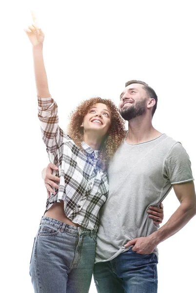 Oung casal olhando para cima e apontando para cima — Fotografia de Stock