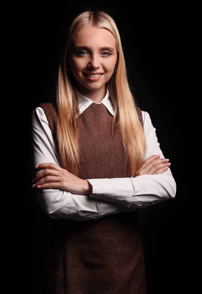 Portrait of a confident young business woman. isolated on a dark — Stock Photo, Image