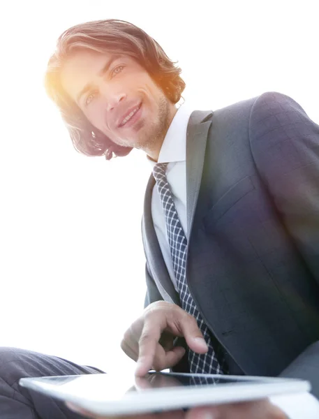 Portrait of successful businessman working on tablet computer. — Stock Photo, Image