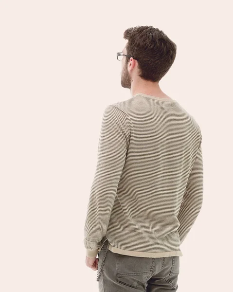 Πίσω όψη. Πλήρες μήκος. Νεαρός άνδρας σε γκρι πουλόβερ — Φωτογραφία Αρχείου