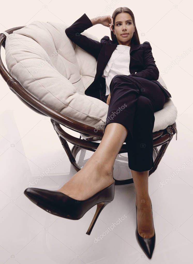 business woman relaxarea in a comfortable chair