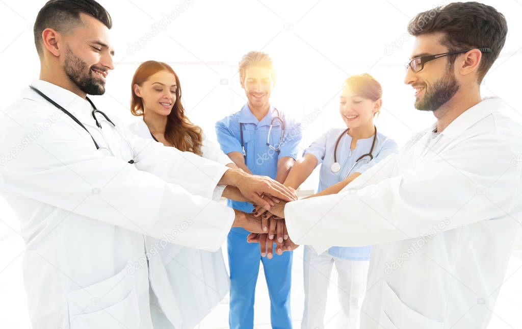 background image of a successful group of doctors on a white bac