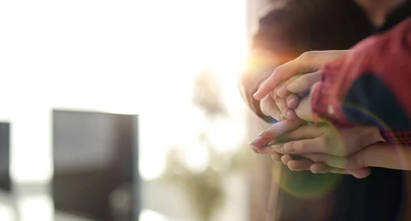 Business background.close-up of folded hands together. — Stock Photo, Image