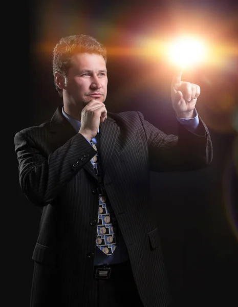 Confident businessman pointing at a blank space — Stock Photo, Image
