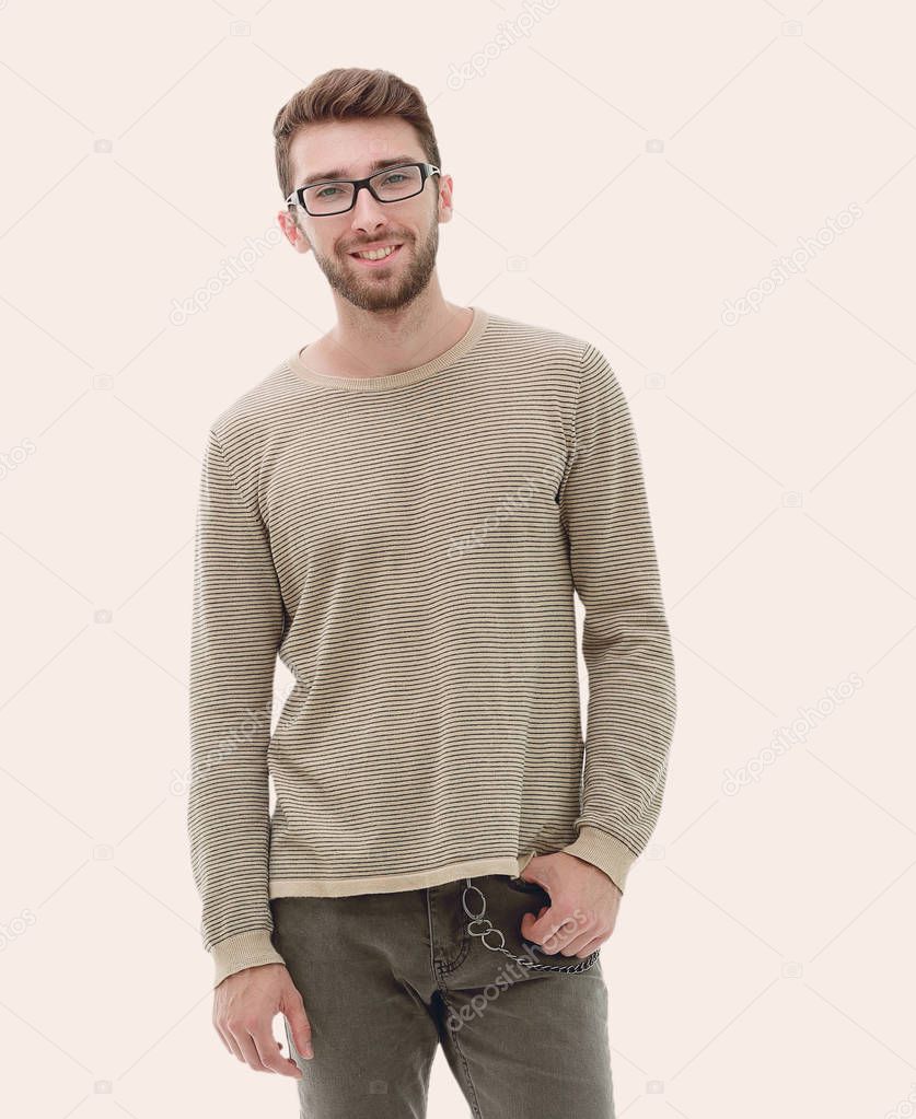 Full length of serious young man with glasses