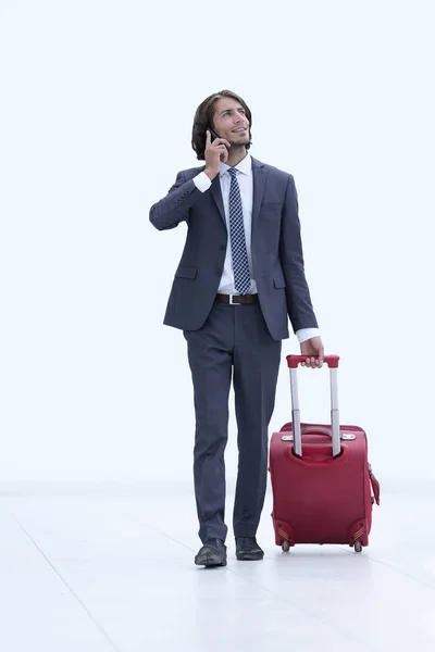 Sukcesy biznesmen z podróży walizka — Zdjęcie stockowe