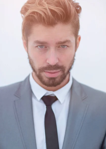 Handsome young man in suit on grey background — Stock Photo, Image