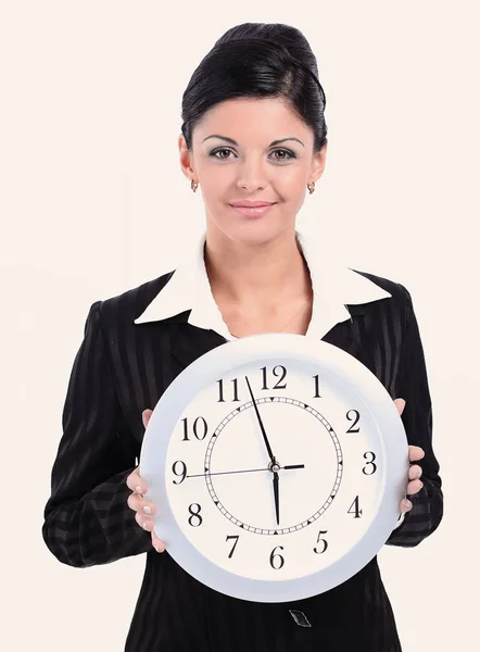 Business concept.business mujer sosteniendo un gran reloj . Imagen de archivo