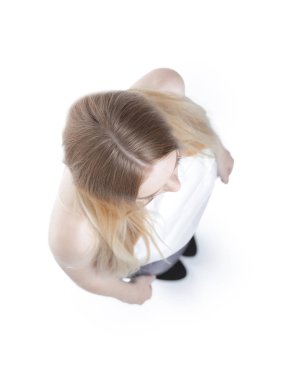 Yukarıdan görüntüleyin. dört gözle başarılı genç iş kadını.