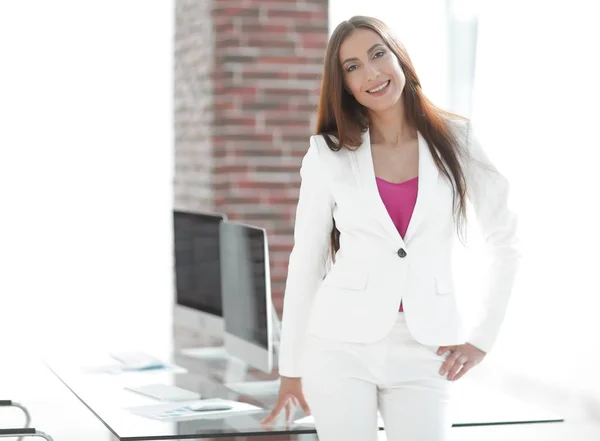 Elegant business woman in a white business suit — Stock Photo, Image