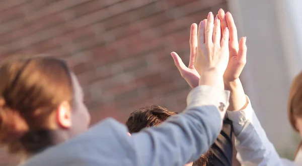 successful business team giving each other a high five