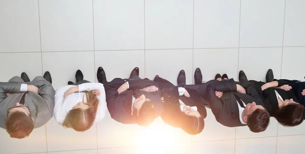 Vista da equipe top.business de pé em uma fileira — Fotografia de Stock
