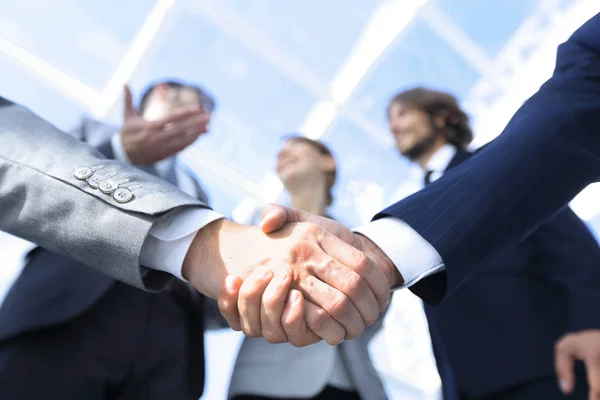 In the foreground.handshake of business partners — Stock Photo, Image