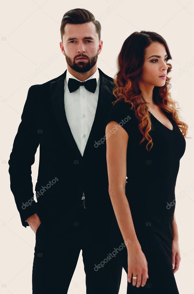 Handsome man and woman in black dress