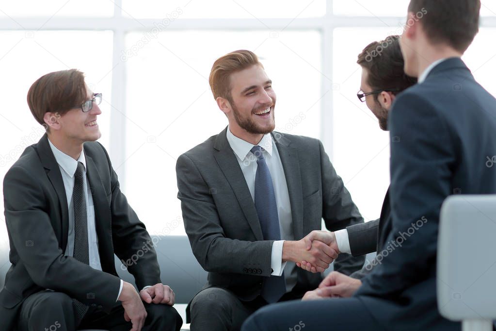 handshake business people in the office.