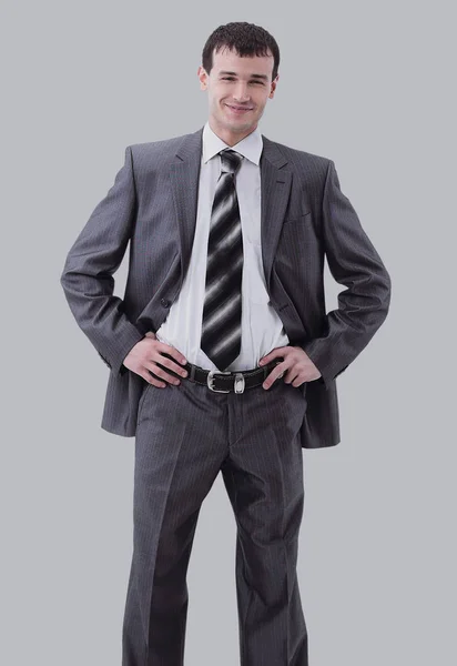 Fullängds porträtt av en säker affärsman isolerade på grå — Stockfoto