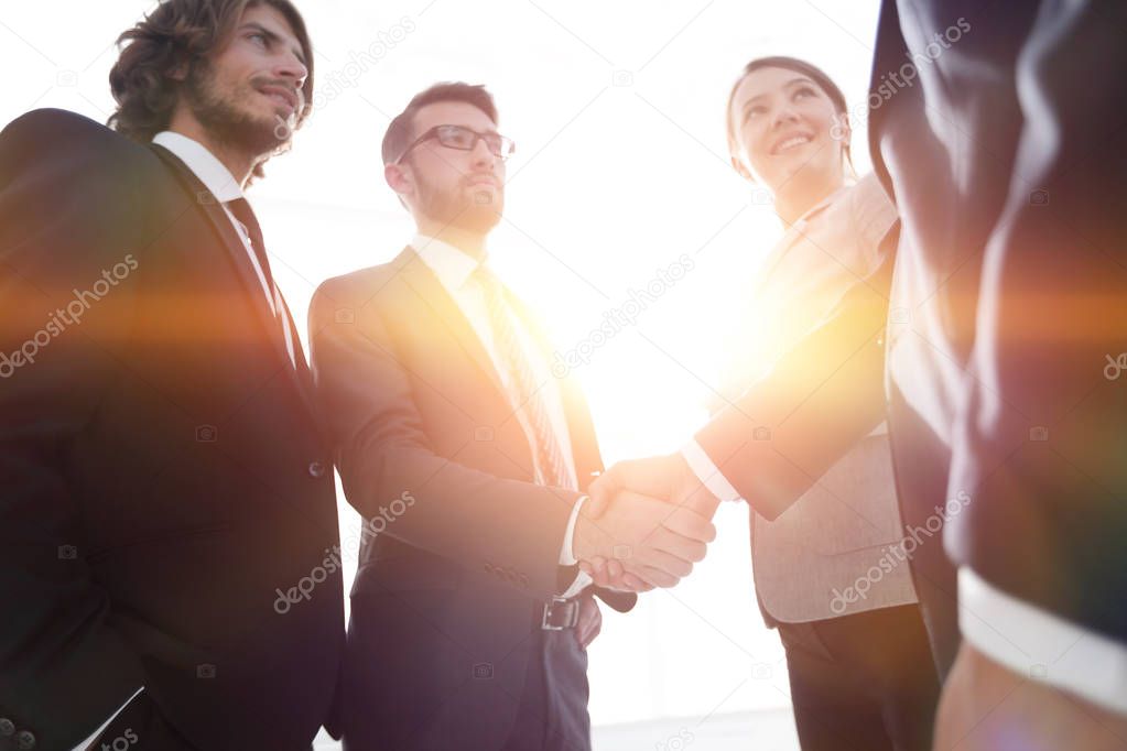 business people handshaking after good deal.