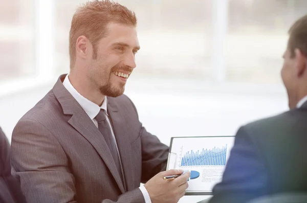 Closeup.business partners discussing marketing schedule — Stock Photo, Image