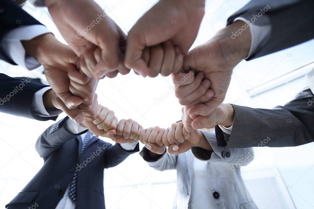 group of people joined their hands