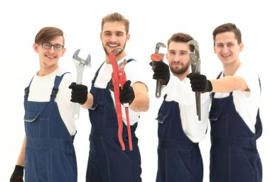Grup inşaat işçileri ile çalışma araçları