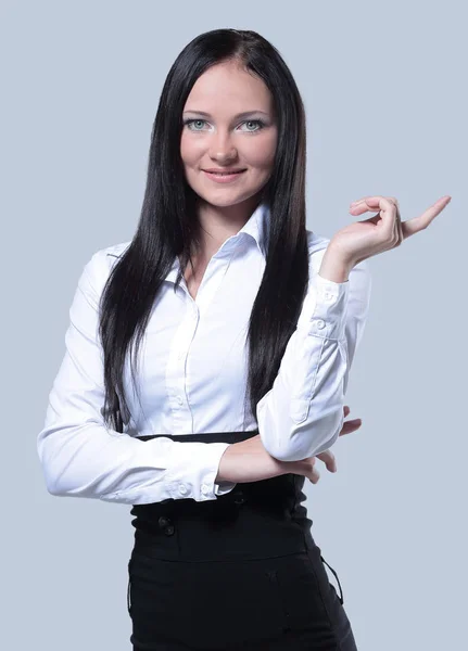 Mulher de negócios com o dedo apontar para cima posando no fundo branco — Fotografia de Stock