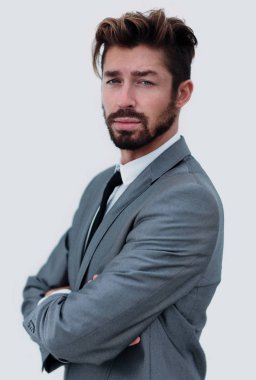 Beyaz bir arka planda izole edilmiş yakışıklı bir adamın portresi.