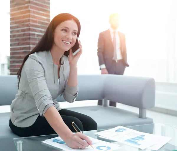 Woman assistant at the workplace in the office — Stock Photo, Image