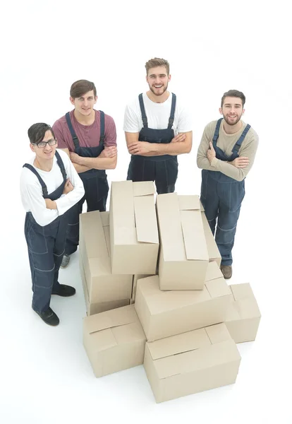 Gelukkig lachend verhuizers uitvoering van vakken, geïsoleerd op een witte pagina — Stockfoto