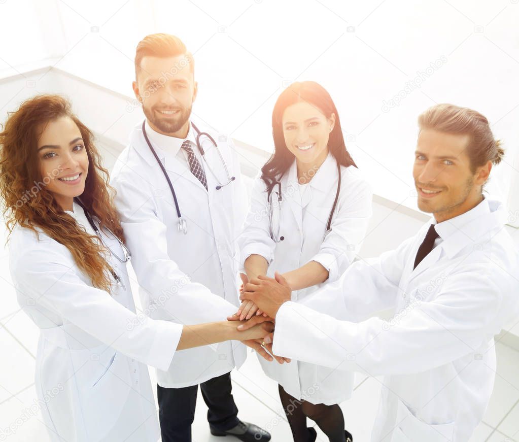 friendly team of doctors shows their success