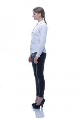 yan görünümü. Kendine güvenen genç bir kadın tam growth.portrait içinde