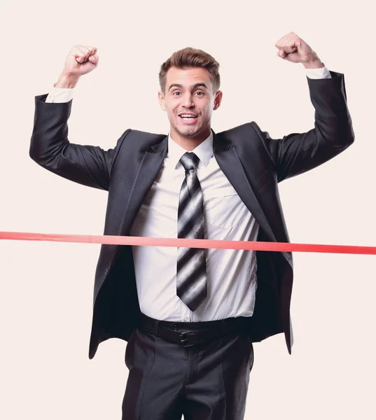 Businessman standing in front of the starting tape — Stock Photo, Image