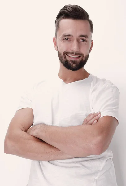 Feliz joven descansando en una pantalla blanca —  Fotos de Stock