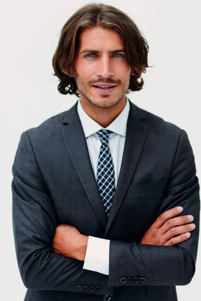 Happy young man with dark hair wearing an elegant suit — Stock Photo, Image