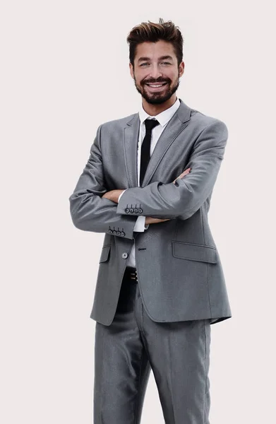 Hombre de negocios exitoso y seguro en traje gris sobre fondo blanco — Foto de Stock