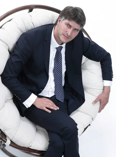 Ovanifrån av framgångsrik affärsman sitter i bekväm stol — Stockfoto