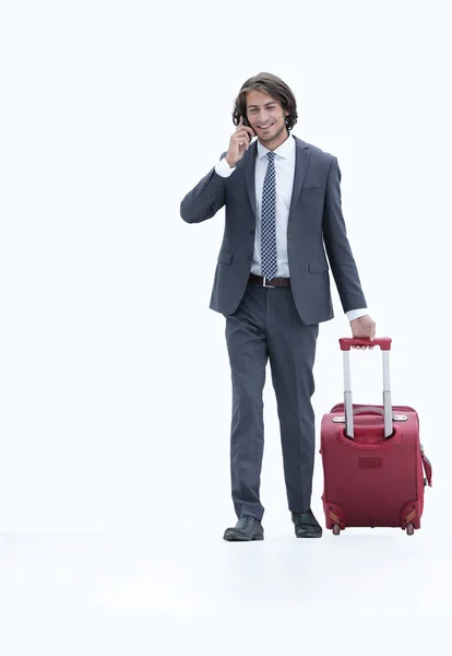 Empresário de sucesso com bagagem falando ao telefone . — Fotografia de Stock