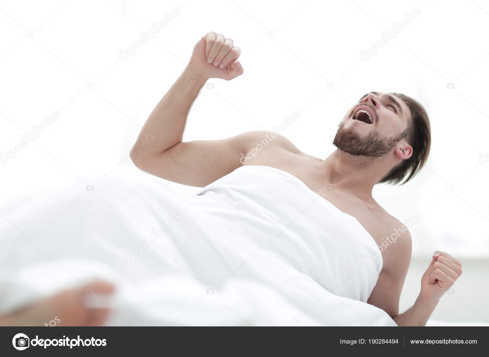 Happy man waking up in the morning Stock Photo by ©depositedhar 190284494