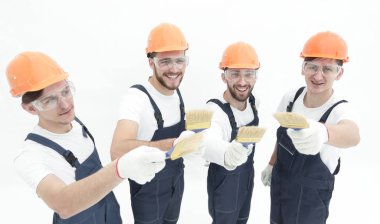 En baştan görüntüleyin. inşaatçılar .isolated beyaz bir grup
