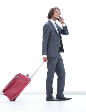 Bagaj bir cep telefonuyla konuşurken ile iş adamı.