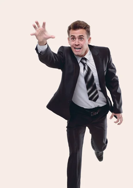 Businessman runs forward stretching out his hand — Stock Photo, Image