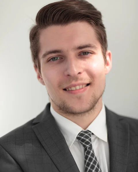 Closeup.the face of a successful young man — Stock Photo, Image