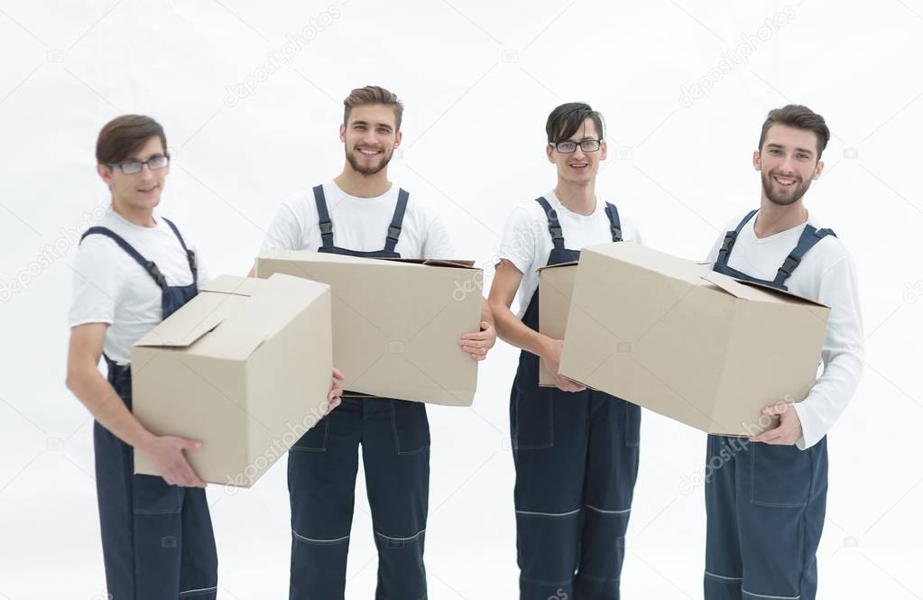 photo workers holding boxes when moving flats,