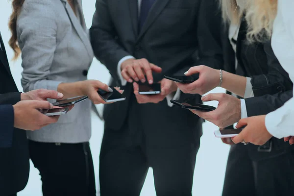 Closeup.business team using smartphones . — Stock Photo, Image