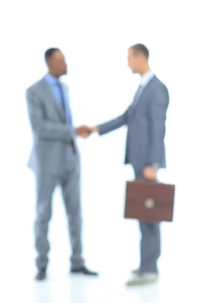 Blurred business people. Handshake of two business men. — Stock Photo, Image